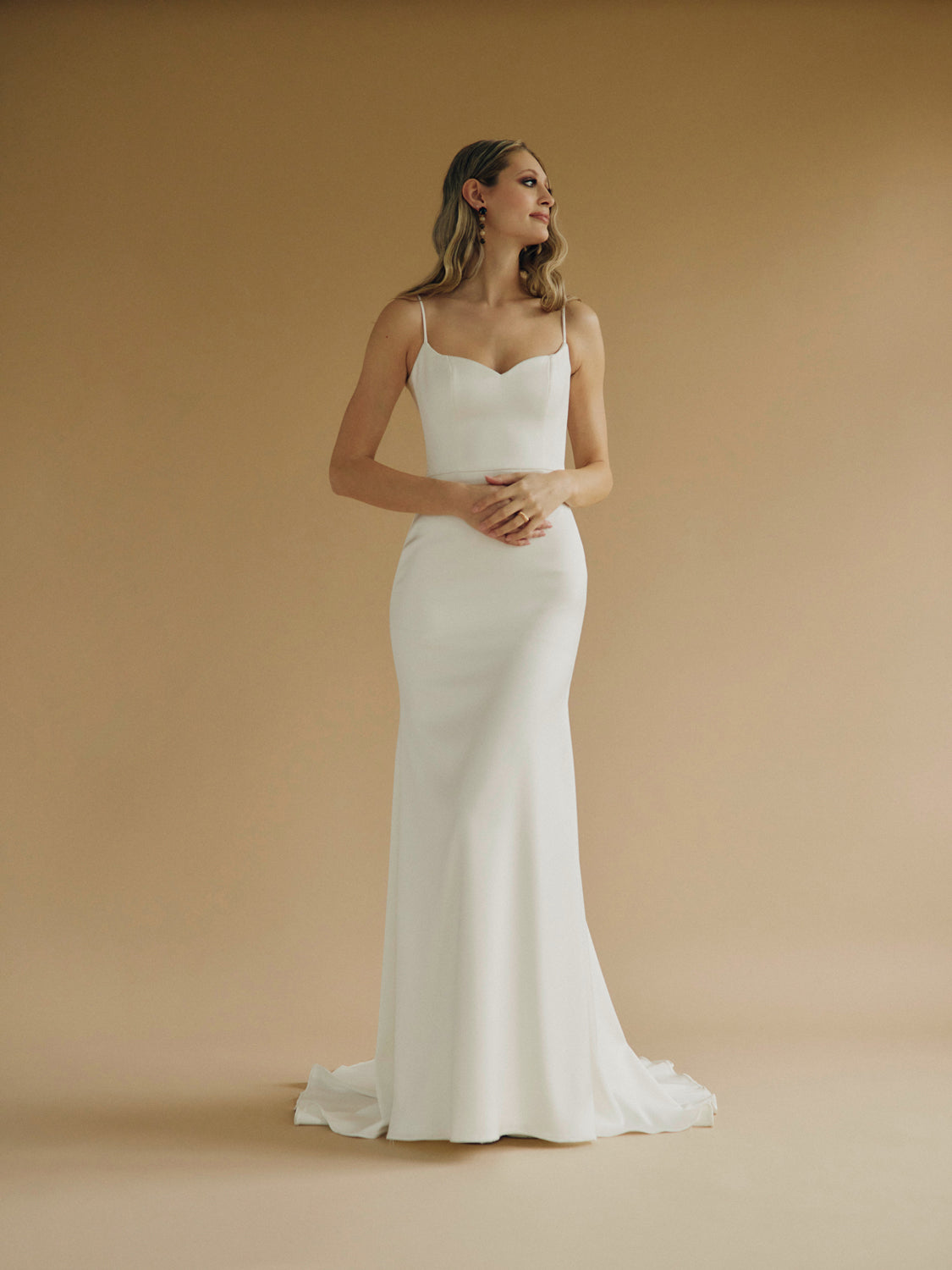 addison modern minimalist wedding dress reviews Addison Rae just served the exact dress silhouette after-party brides are saving to their moodboards. The short hemline, the navel-grazing neckline, the confident, no-rules energy, this is the perfect shift from ceremony